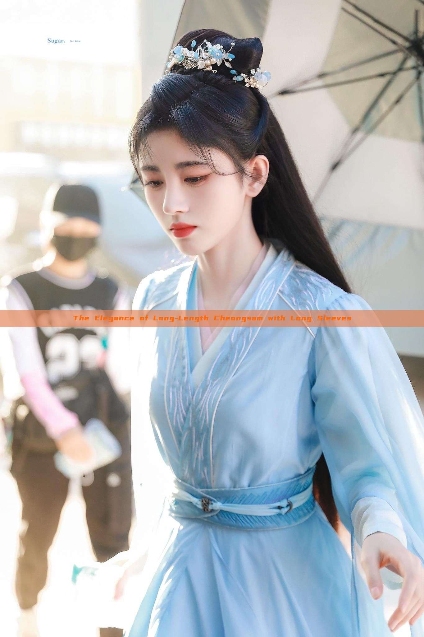 The Elegance of Long-Length Cheongsam with Long Sleeves The Elegance of Long-Length Cheongsam with Long Sleeves