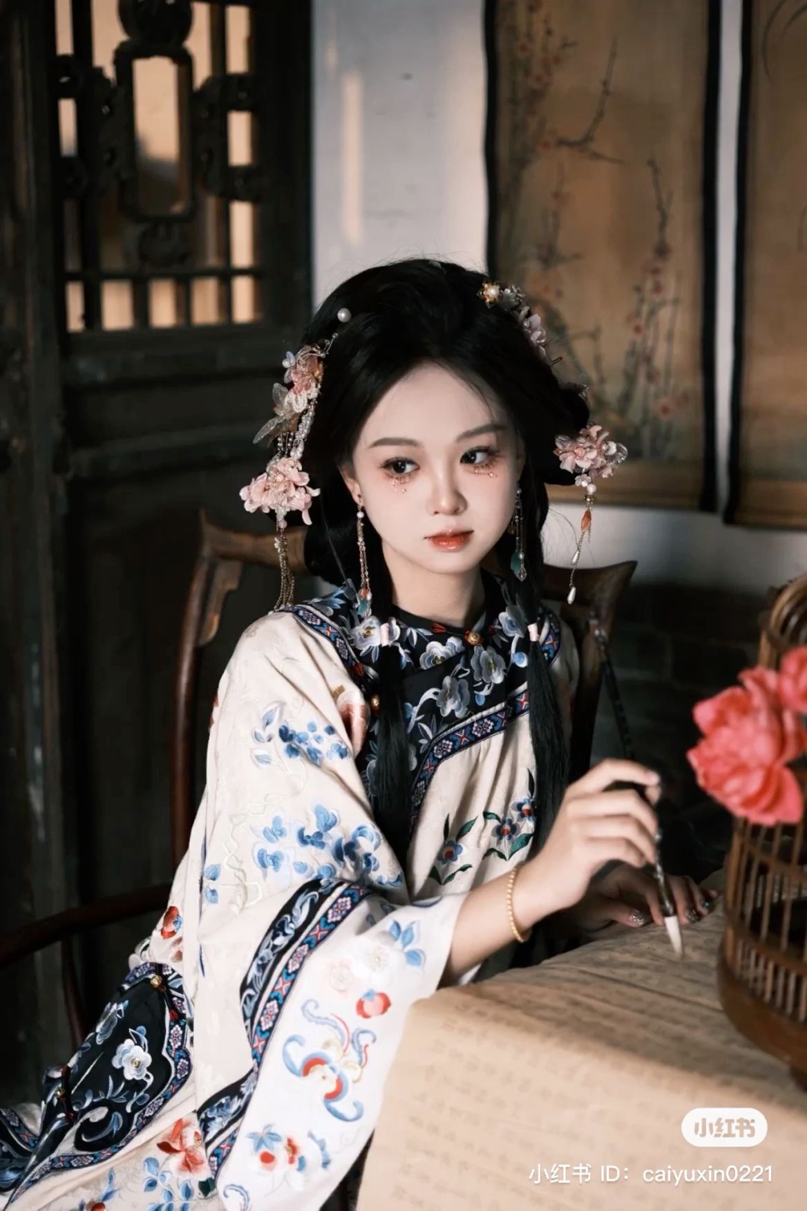 The Elegance of a Short Black Cheongsam with Long Sleeves