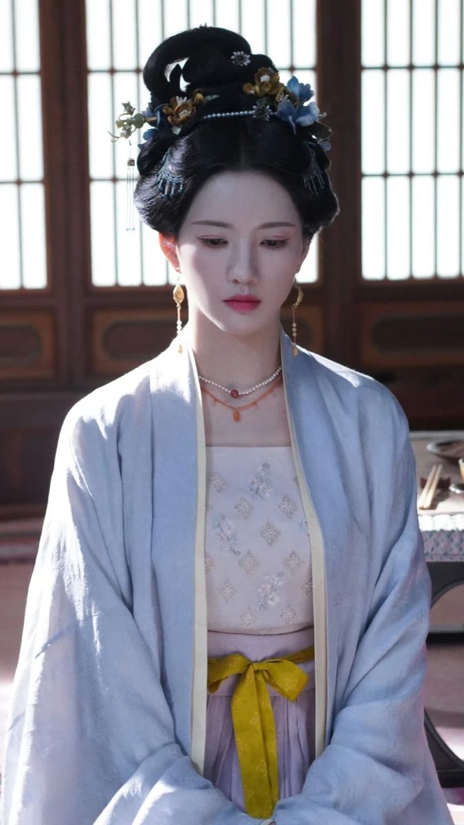 The Little Girl in a Traditional Hanfu Dress The Little Girl in a Traditional Hanfu Dress