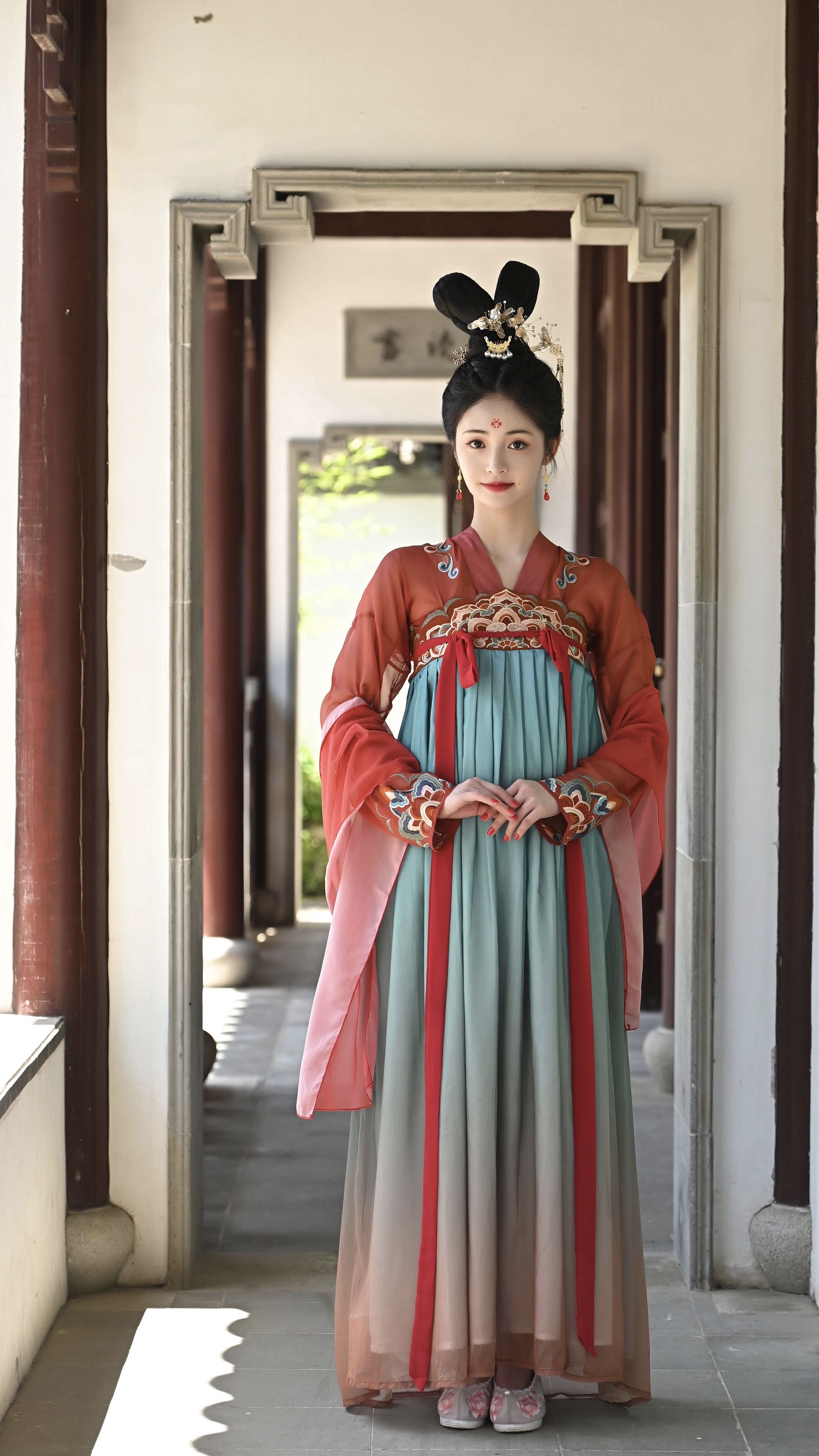 The Evolution of the Girls Cheongsam with a Neck-Hanging Style