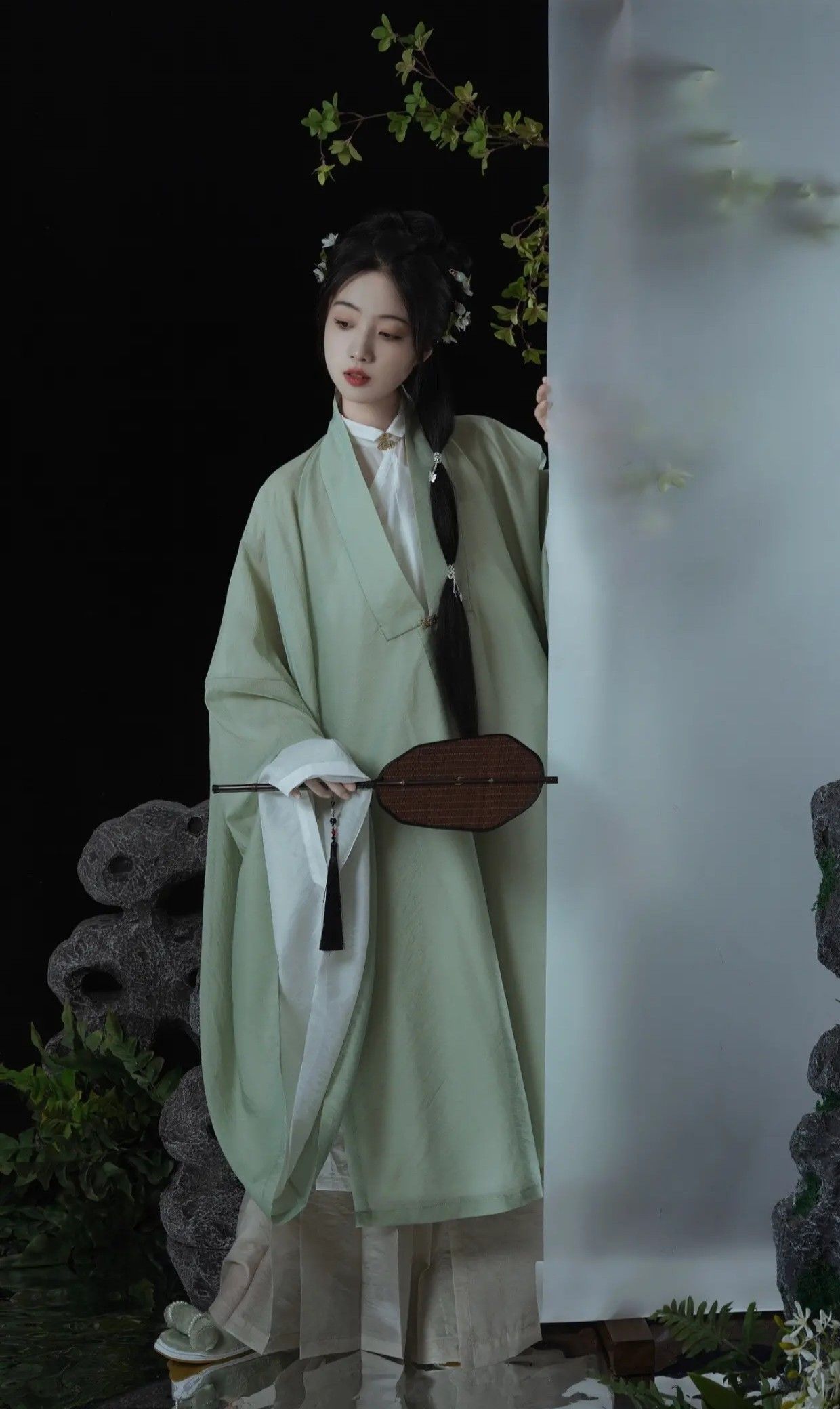 The Enchantment of a Black Qipao in Autumn and Winter