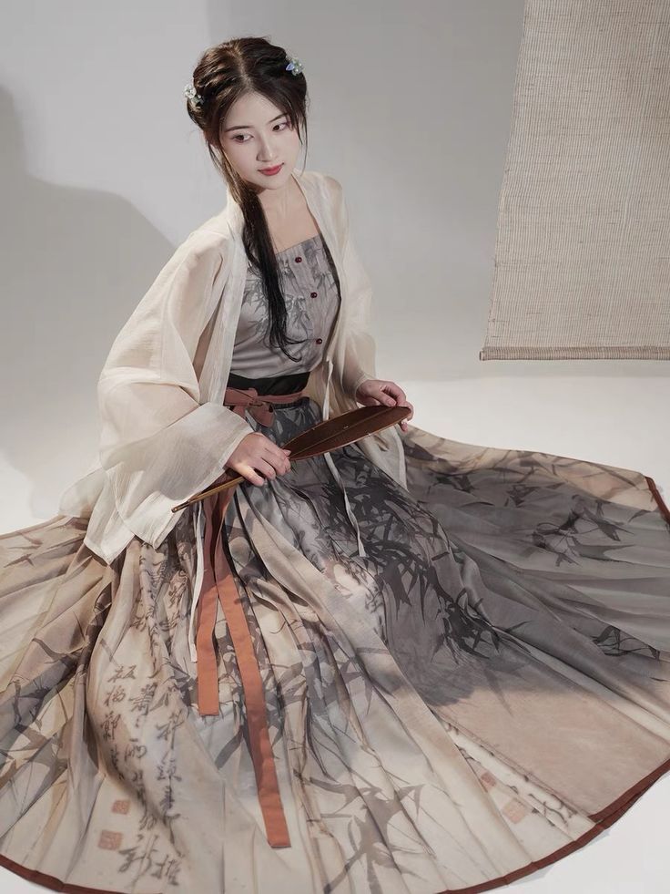 The Long-Style Cheongsam as a Stunning Stage Walk Showpiece