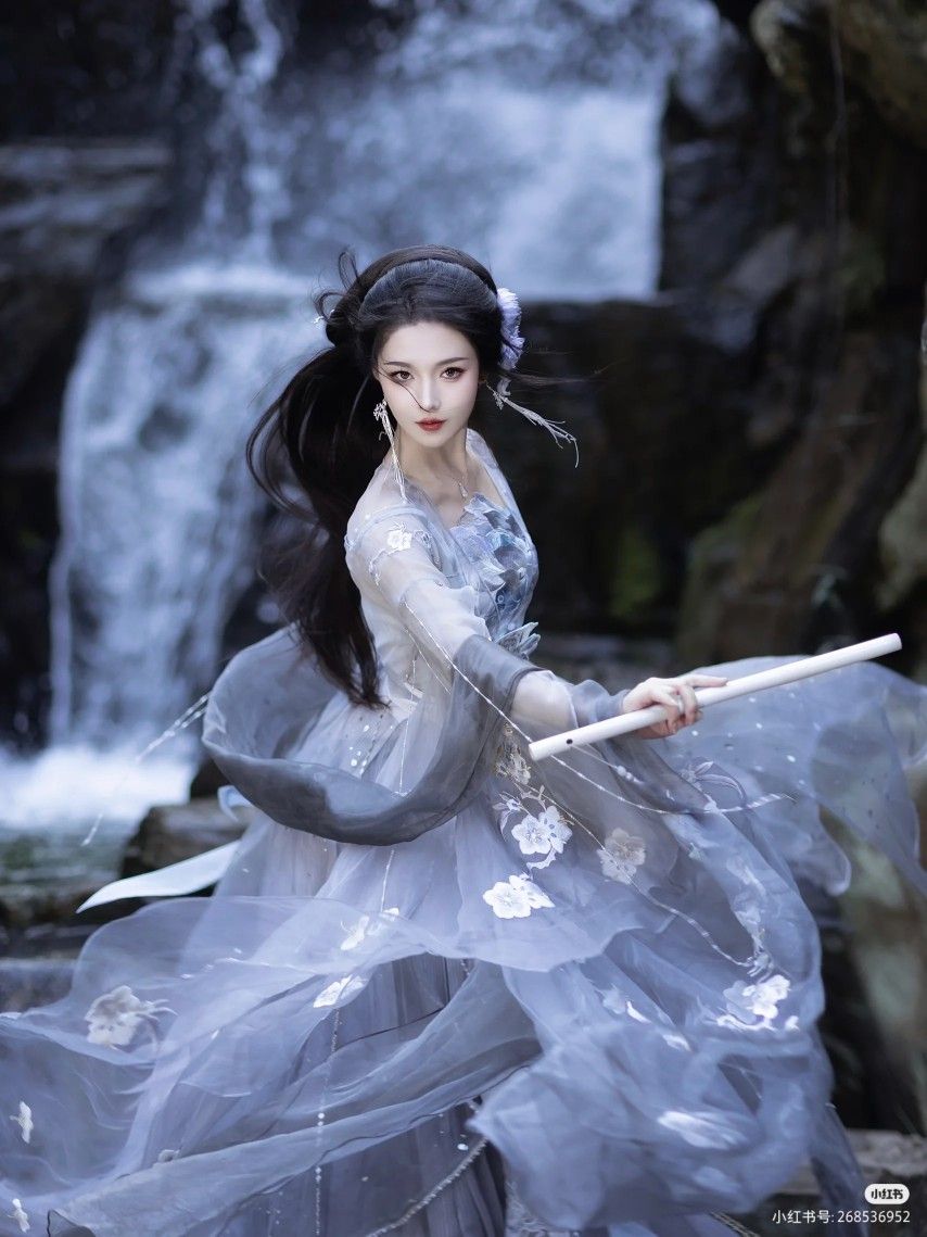 The Elegance of Cheongsam with an Overcoat of a Cape:A Cultural Exploration The Elegance of Cheongsam with an Overcoat of a Cape:A Cultural Exploration
