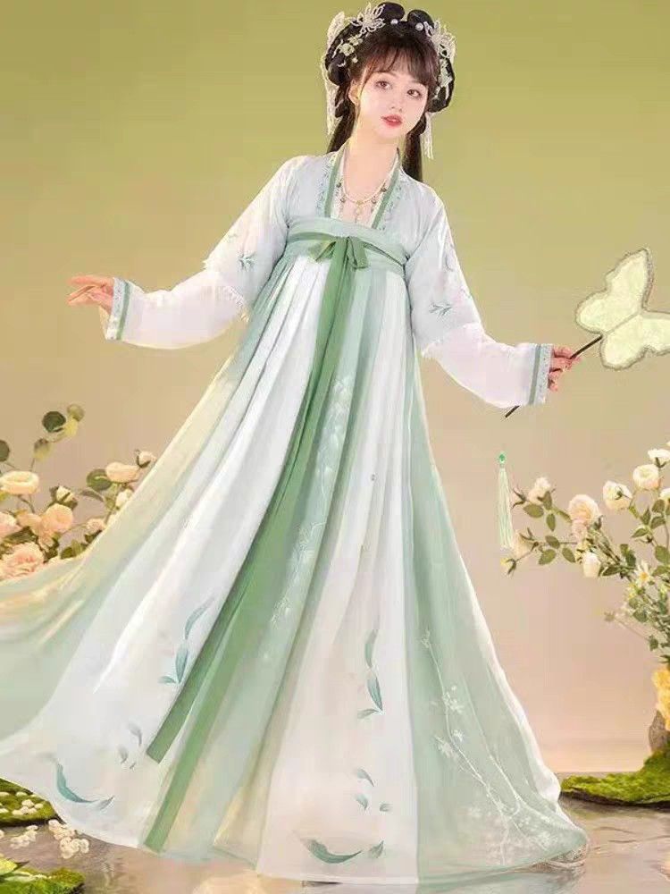Traditional Charm of Tang Suit with Cheongsam-Style Skirt