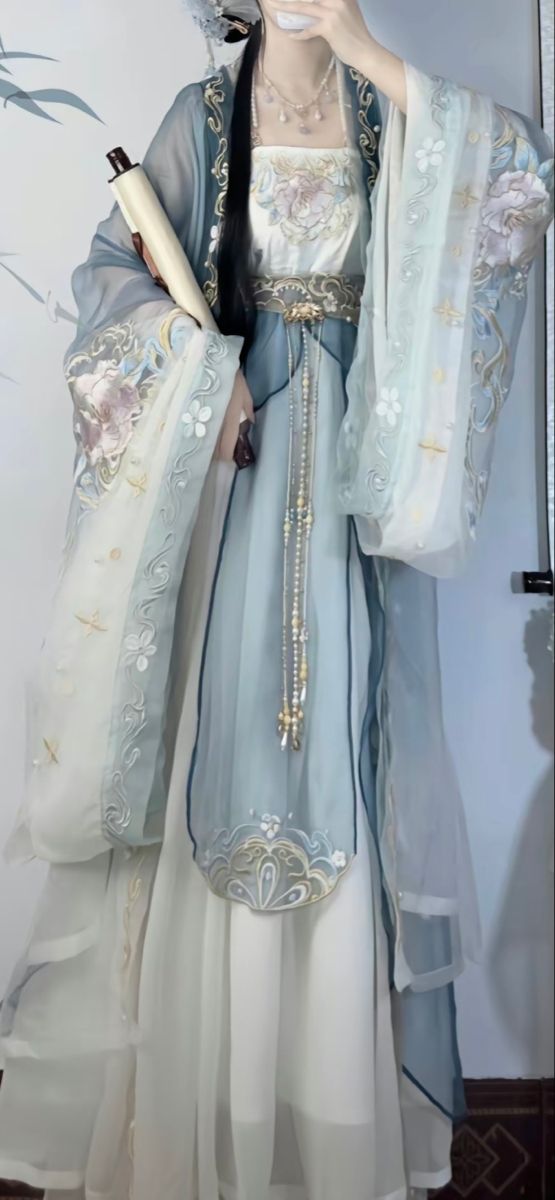 The Elegance of Long-sleeved Engagement Cheongsam A Traditional Chinese Wedding Attire