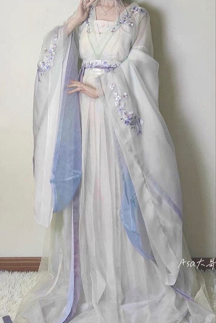 Embracing Elegance:A Lace Cheongsam-Inspired Dress with a Low-Cut Collar